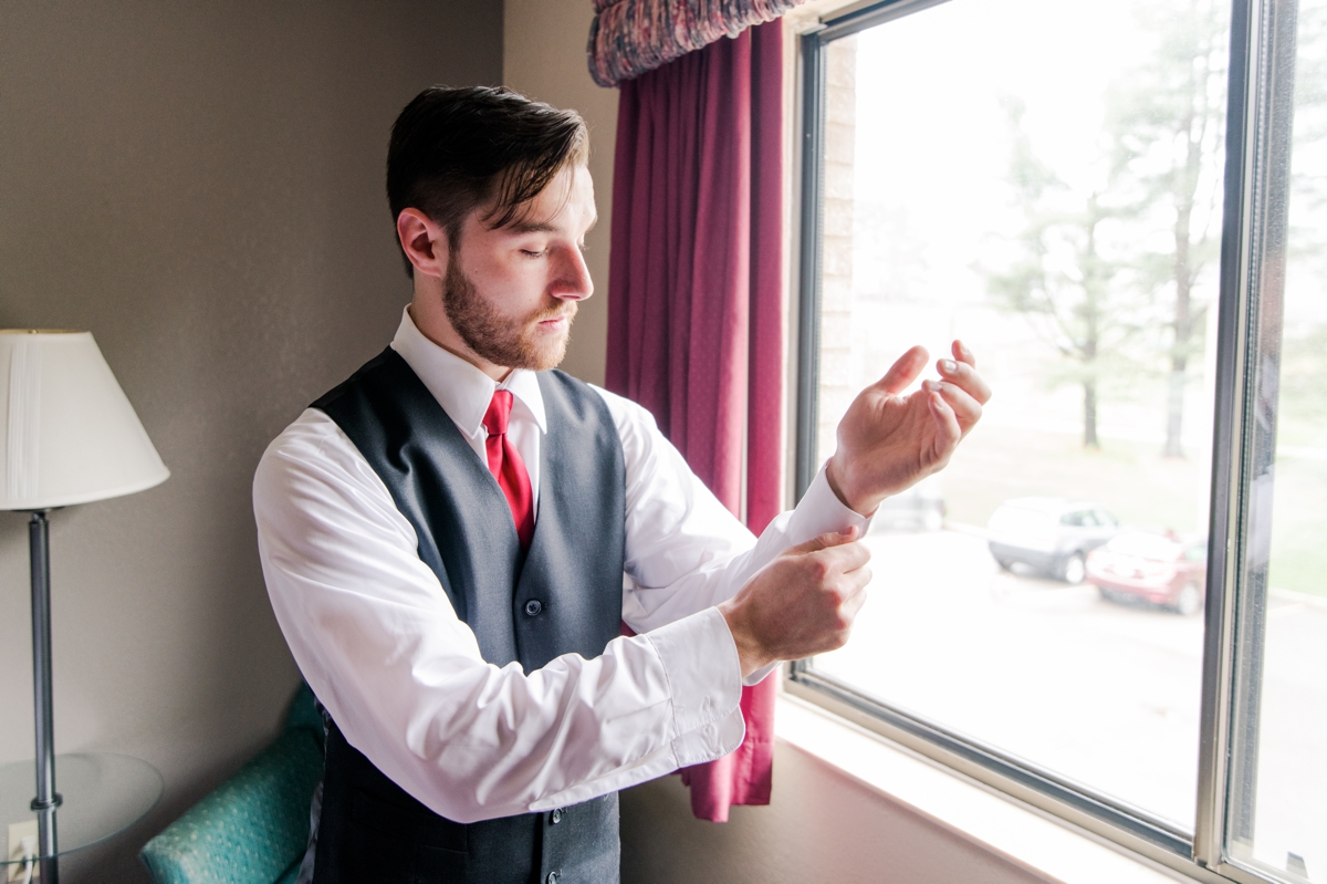 A groom preparing for his wedding day following our advice!