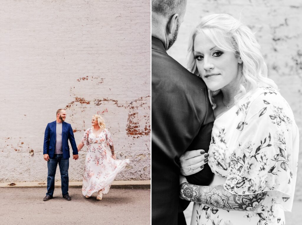 Downtown cincinnati engagement photos of an older couple with tattoos having fun next to a distressed wall